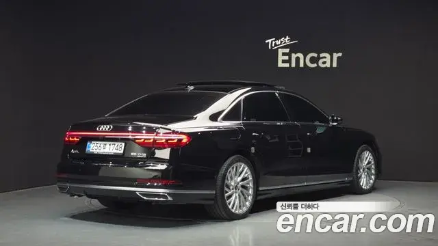Audi A8 2021 — Фото 2/20