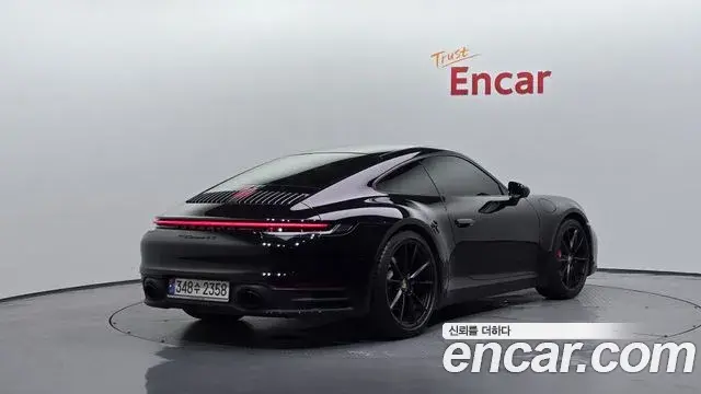 Porsche 911 2024 — ფოტო 1/30