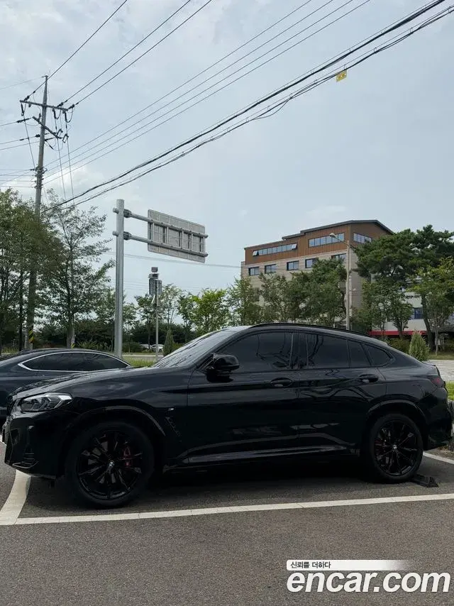 BMW X4 2024 — Фото 1/12