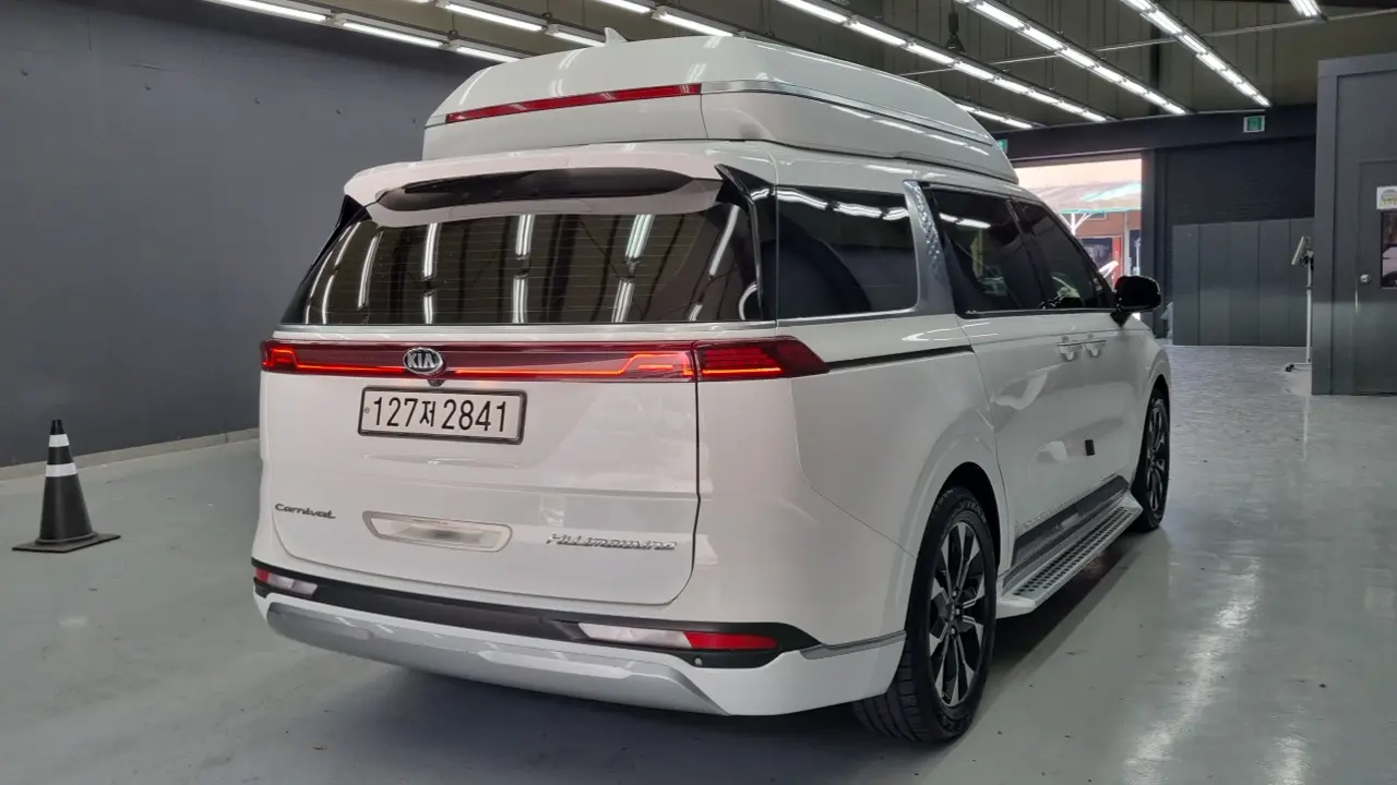 Kia Carnival 2021 — ფოტო 1/18