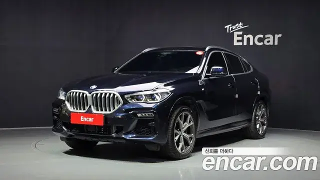 BMW X6 2021 — Фото 1/20