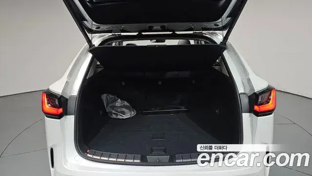 Lexus NX450h+ 2022 — Photo 26/38