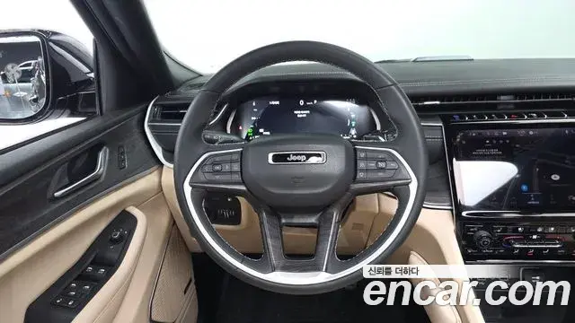 Jeep Grand Cherokee 2023 — Фото 12/20