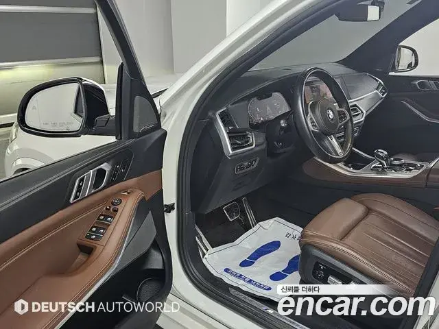 BMW X5 2021 — ფოტო 4/20