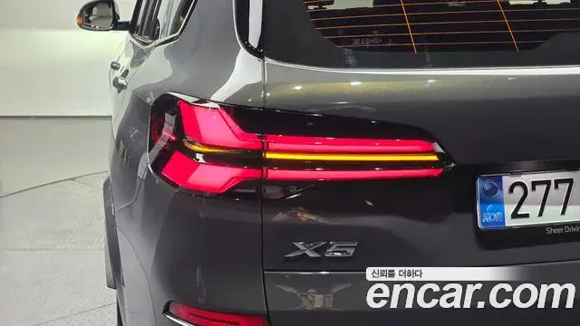 BMW X5 2025 — ფოტო 23/31