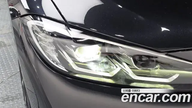 BMW 4 Series 2023 — ფოტო 33/35
