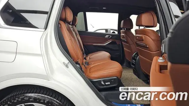 BMW X7 2024 — Фото 12/20