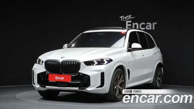 BMW X5 2024 — ფოტო 13/20