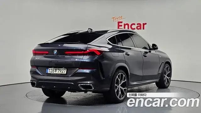 BMW X6 2021 — ფოტო 23/33