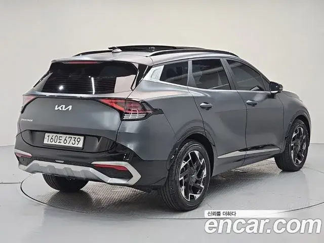 Kia Sportage 2023 — Photo 1/19