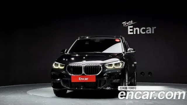 BMW X1 2021 — ფოტო 19/20