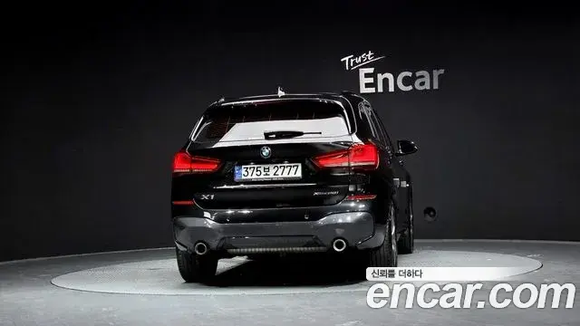 BMW X1 2021 — ფოტო 9/20
