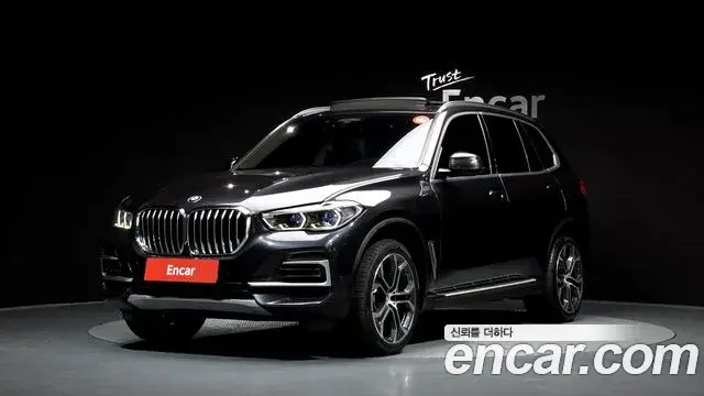 BMW X5 2021 — Фото 1/20