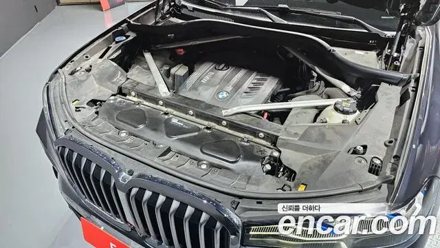 BMW X7 2020 — ფოტო 14/20