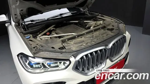 BMW X6 2022 — ფოტო 28/34