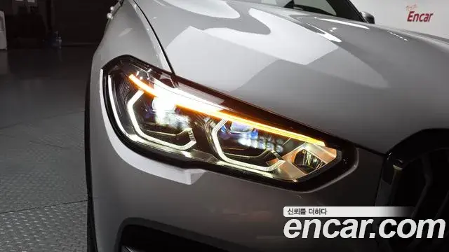 BMW X5 2022 — ფოტო 25/34