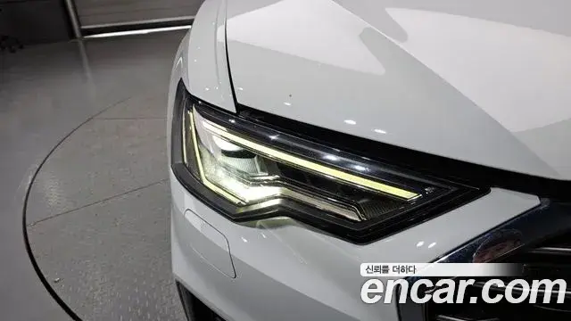Audi A6 2021 — ფოტო 30/34
