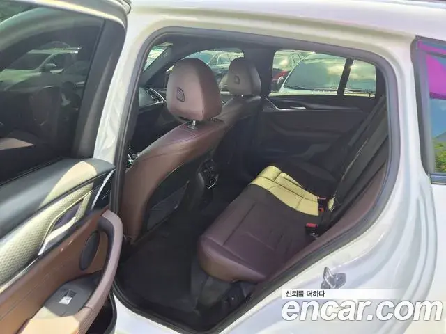 BMW X4 2022 — ფოტო 8/20