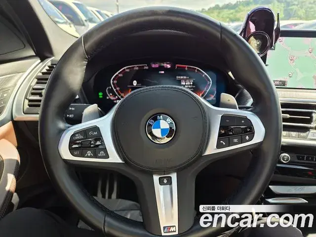 BMW X4 2022 — ფოტო 17/20