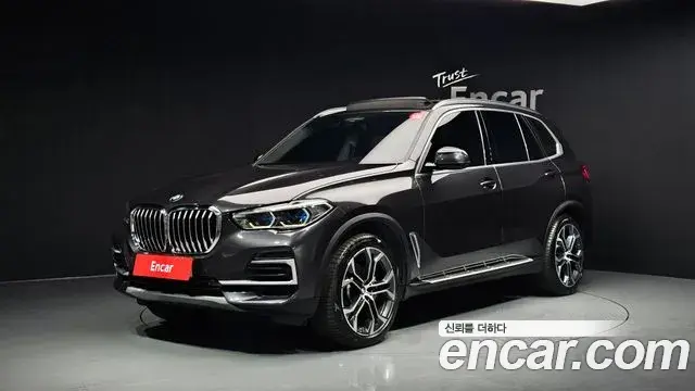 BMW X5 2022 — Фото 1/20