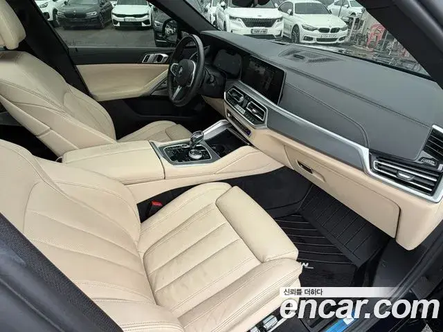 BMW X6 2021 — Фото 11/20