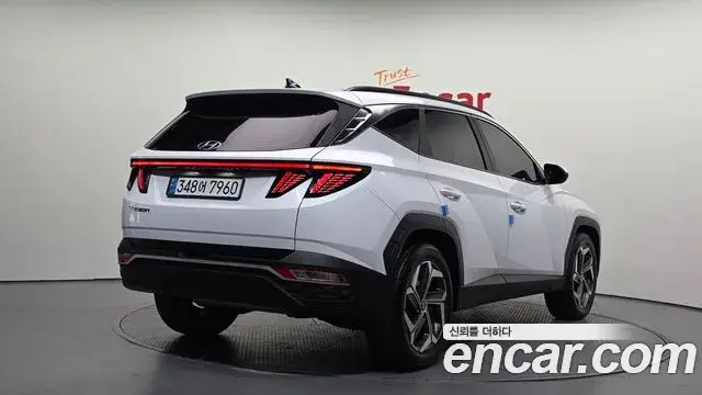 Hyundai Tucson Hybrid 2021 — ფოტო 16/30
