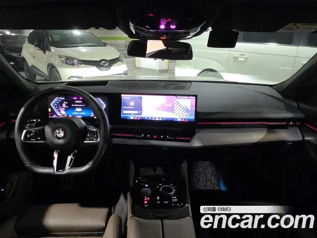 BMW 5 Series 2023 — ფოტო 10/20