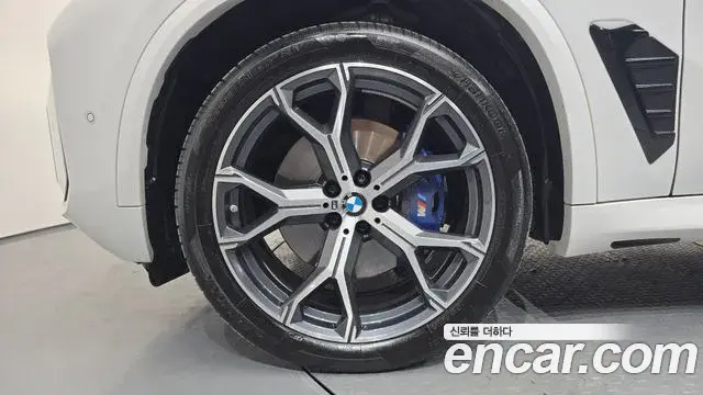 BMW X5 2023 — ფოტო 19/32