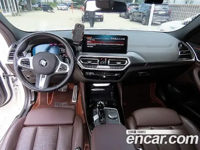 BMW X4 2022 — Фото 10/20