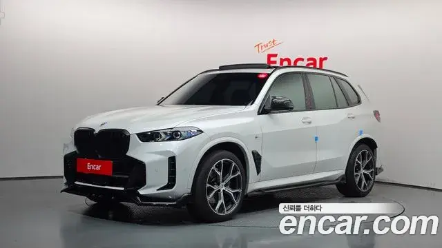 BMW X5 2023 — Фото 1/20