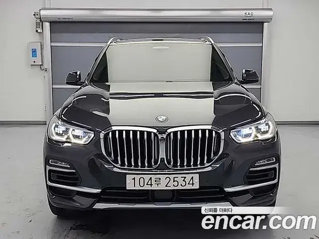 BMW X5 2021 — Фото 1/20