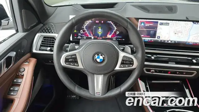 BMW X5 2025 — ფოტო 14/20