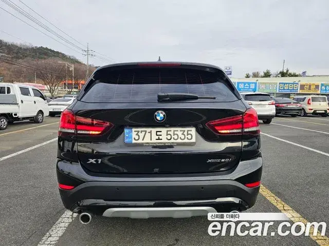 BMW X1 2021 — ფოტო 19/20
