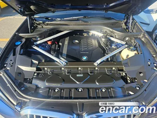 BMW X5 2021 — ფოტო 18/20