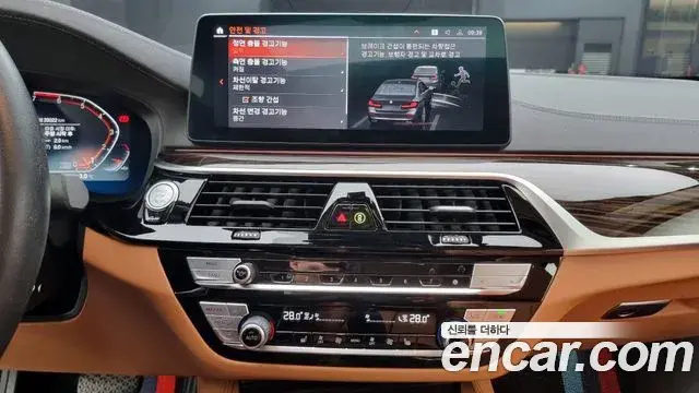 BMW 5 Series 2023 — Фото 14/20