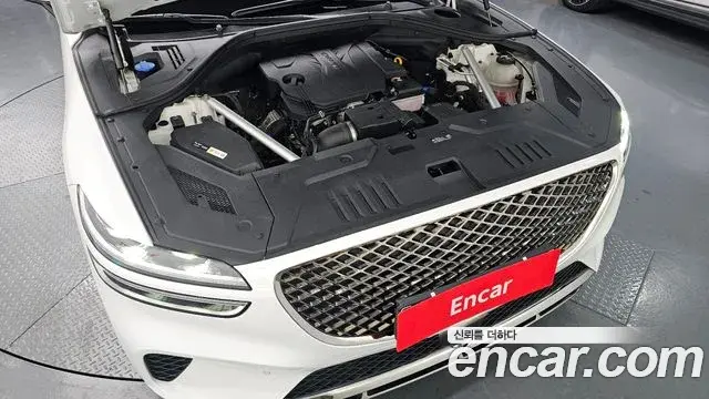 Genesis GV70 2021 — ფოტო 16/20