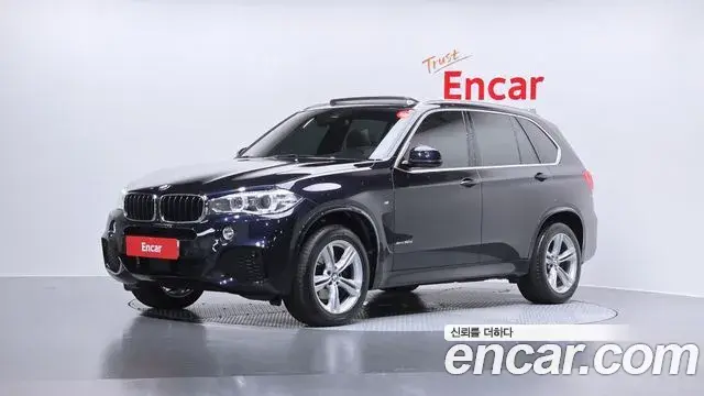BMW X5 2018 — Фото 1/20