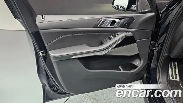 BMW X5 2023 — ფოტო 26/32