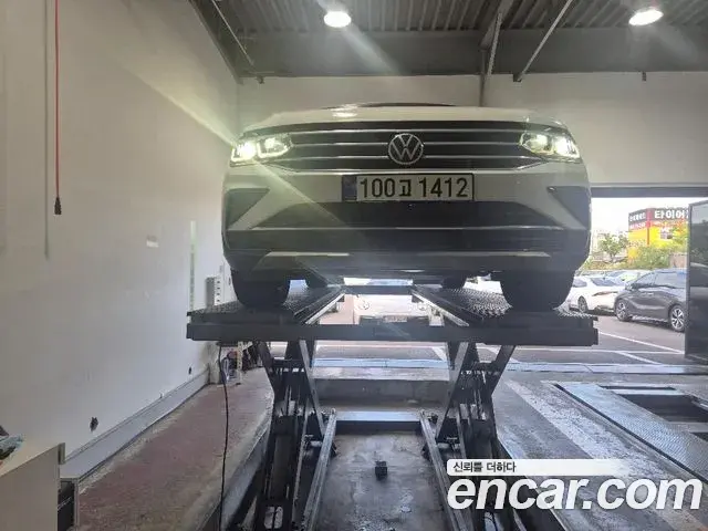 Volkswagen Tiguan 2022 — ფოტო 1/3