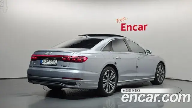 Audi A8 2023 — Фото 2/20