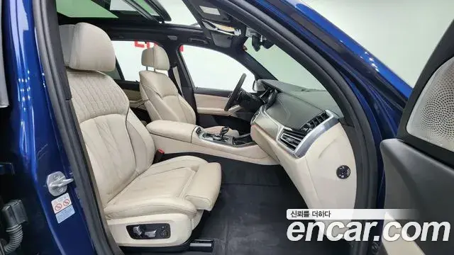 BMW X5 2021 — ფოტო 7/20