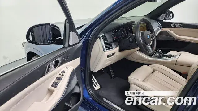 BMW X5 2021 — ფოტო 13/20