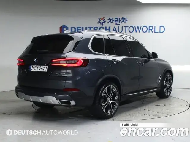 BMW X5 2022 — Фото 1/20