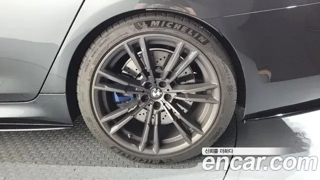 BMW M5 2020 — ფოტო 13/33