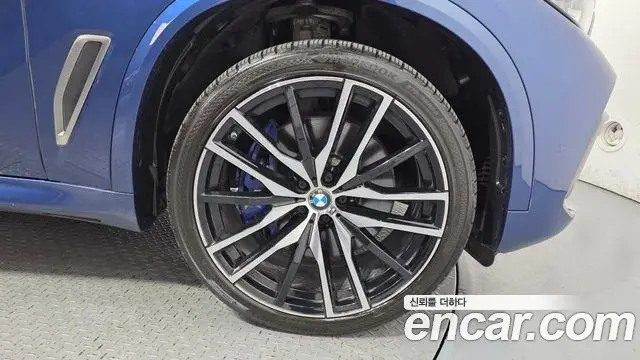 BMW X5 2020 — ფოტო 26/33