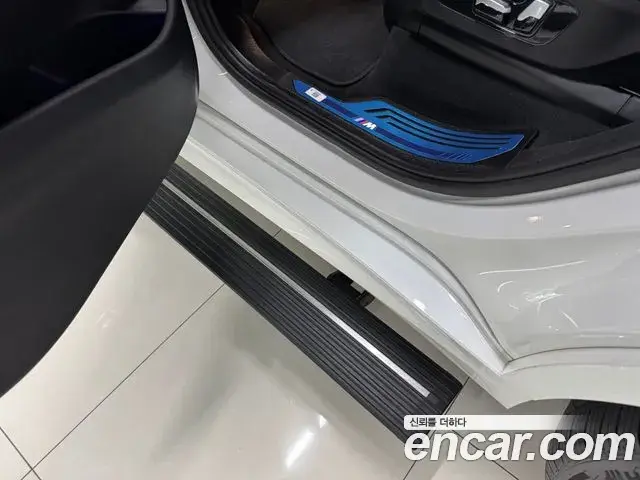 BMW X7 2023 — ფოტო 14/16