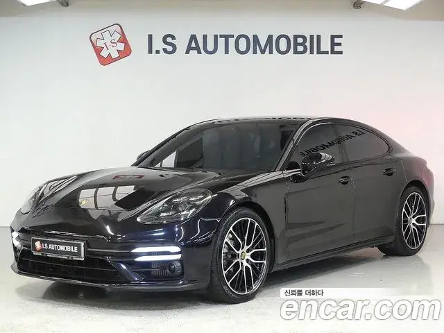Porsche Panamera 2021 — Фото 1/20