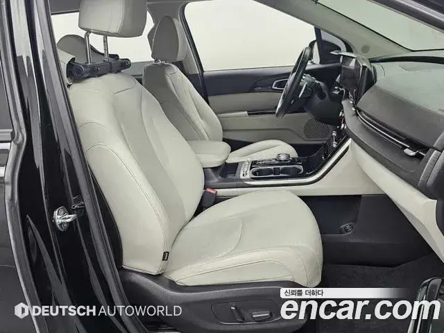Kia Carnival 2021 — Фото 8/20