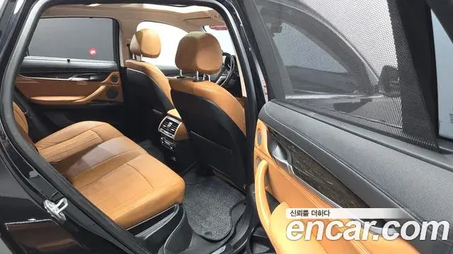 BMW X6 2018 — Фото 11/20