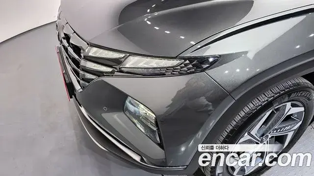 Hyundai Tucson Hybrid 2021 — ფოტო 16/33